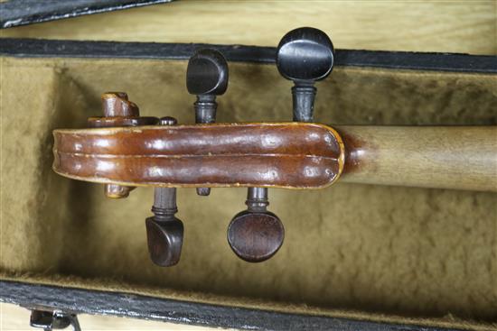 A mandolin and a cased violin